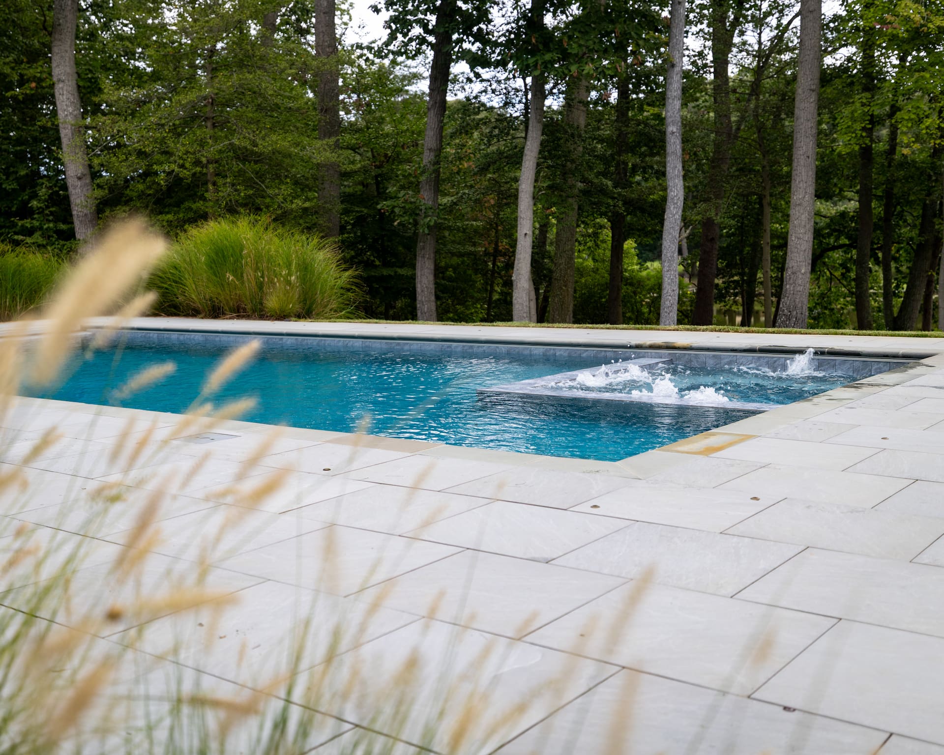 custom pool with attached spa