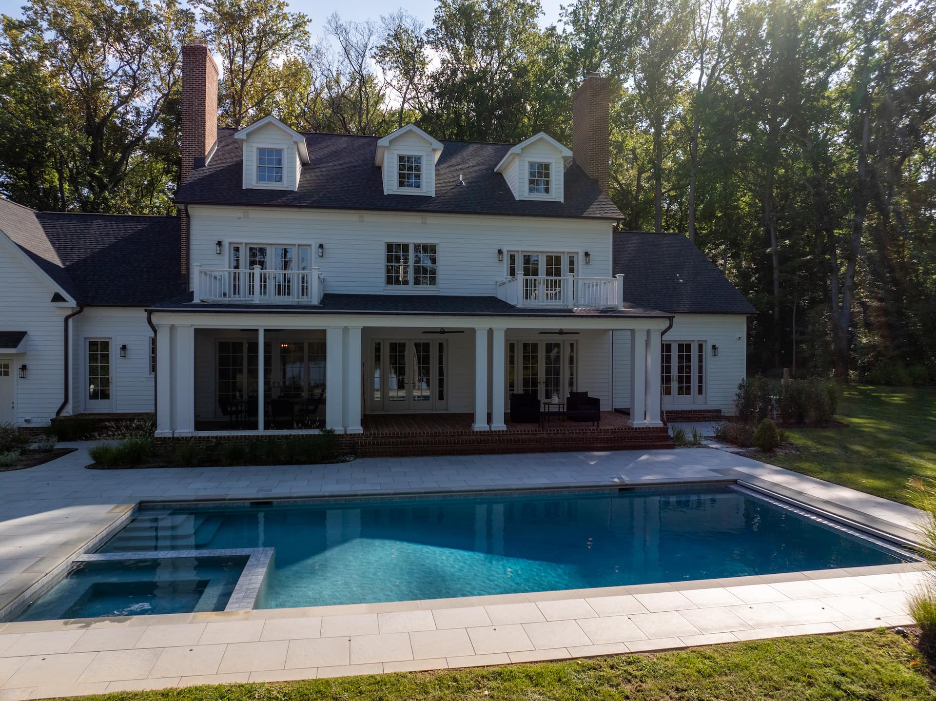 geometric pool and spa in partial shade