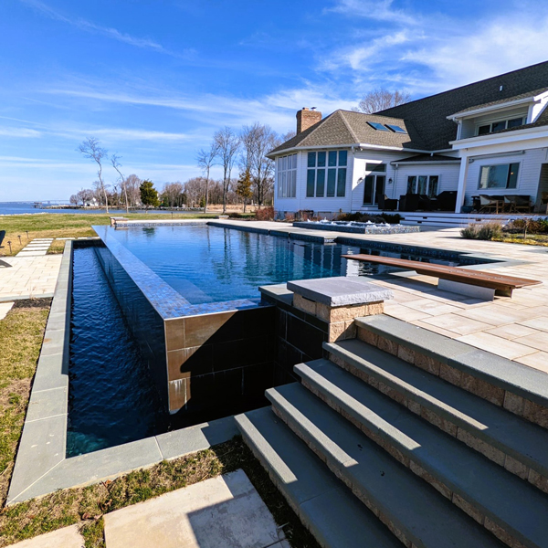 infinity edge pool with detached spa