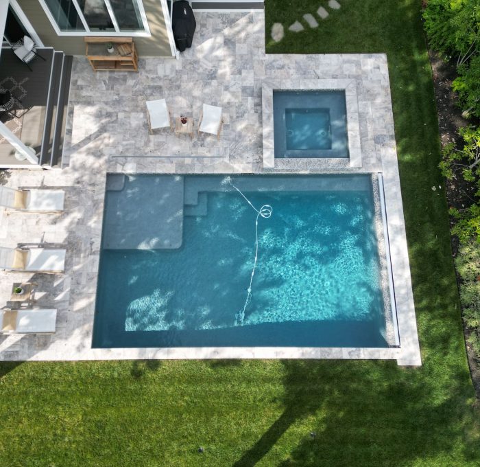 geometric pool with spa aerial view